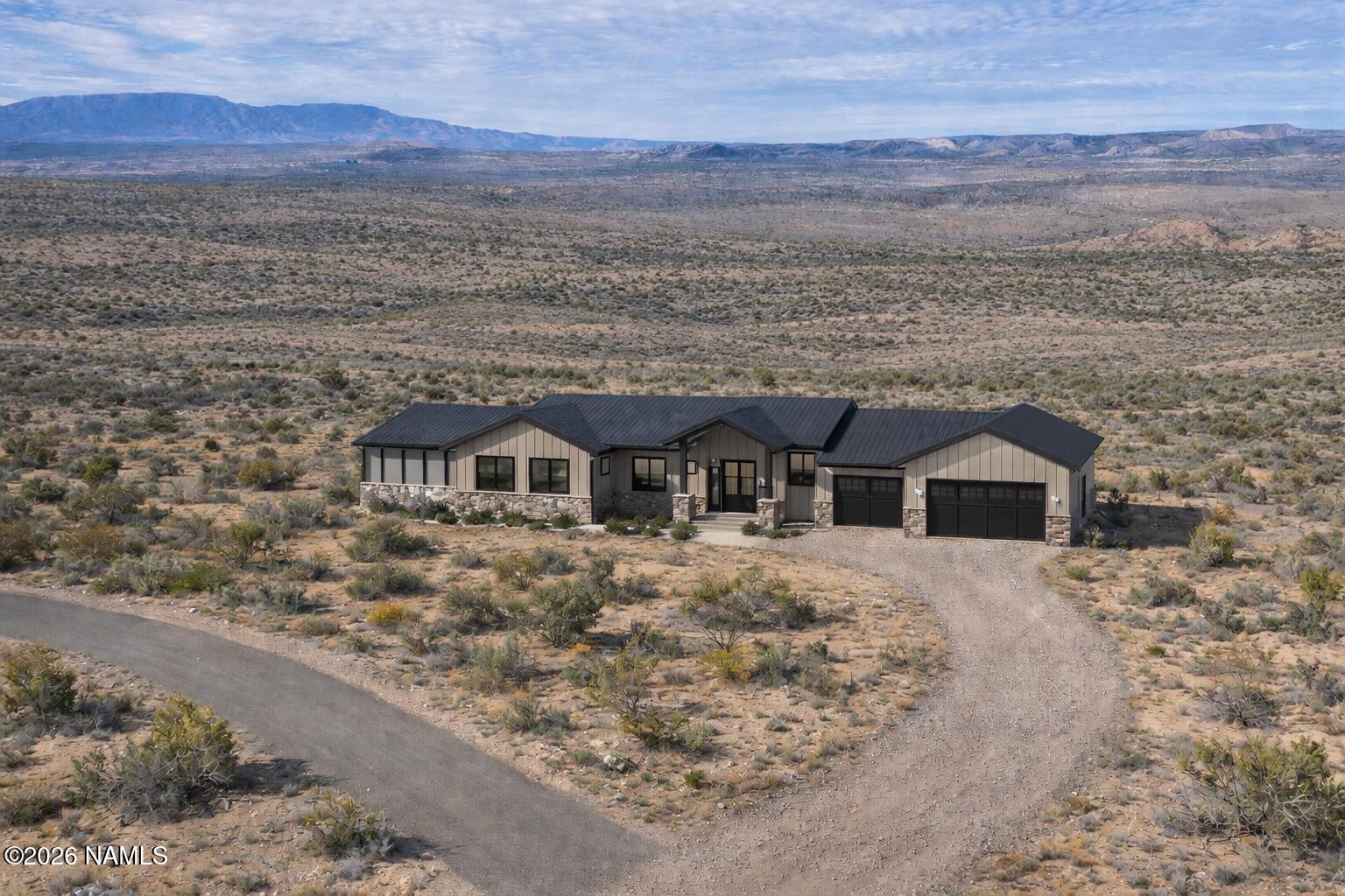 6679 North Canyon Road Rimrock, AZ 86335 - Photo 24 of 24 a front view of a house with a yard