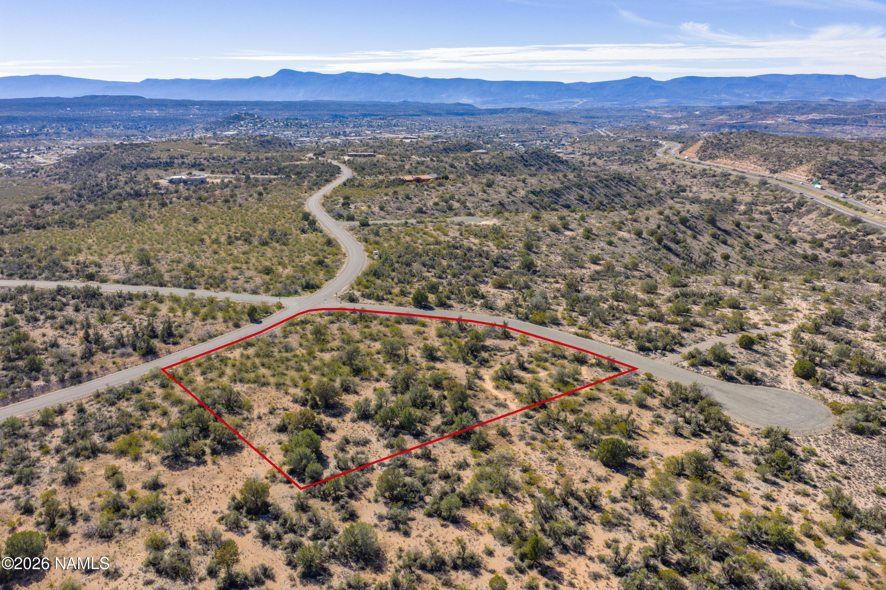6679 North Canyon Road Rimrock, AZ 86335 - Photo 7 of 24 a view of a field with a mountain in the background