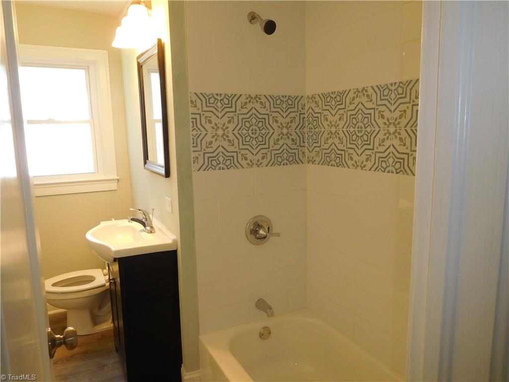 724 Sain Road Mocksville, NC 27028 - Photo 15 of 21 Full Bath is updated and Cute! Tile backsplash for Tub/Shower.