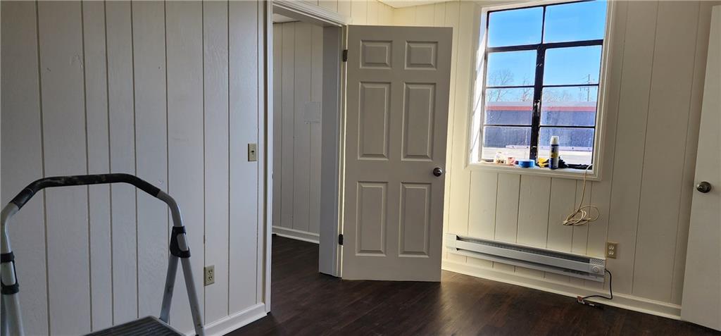 1529 South 15-29 S Main St Street, Unit 3 3 Jasper, GA 30143 - Photo 3 of 6 a view of a hallway with wooden floor and staircase