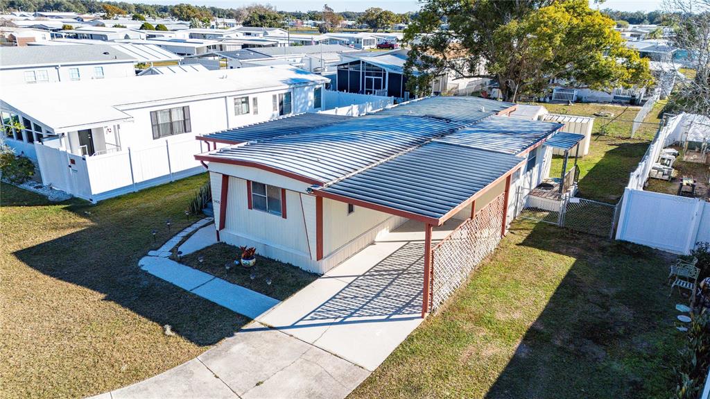 5408 Dean Dairy Road Zephyrhills, FL 33541 - Photo 21 of 62 an aerial view of a house with a yard