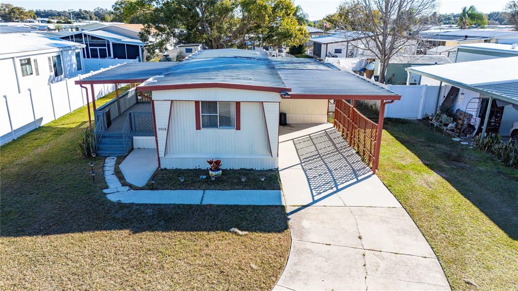 5408 Dean Dairy Road Zephyrhills, FL 33541 - Photo 5 of 62 a view of a house with a yard