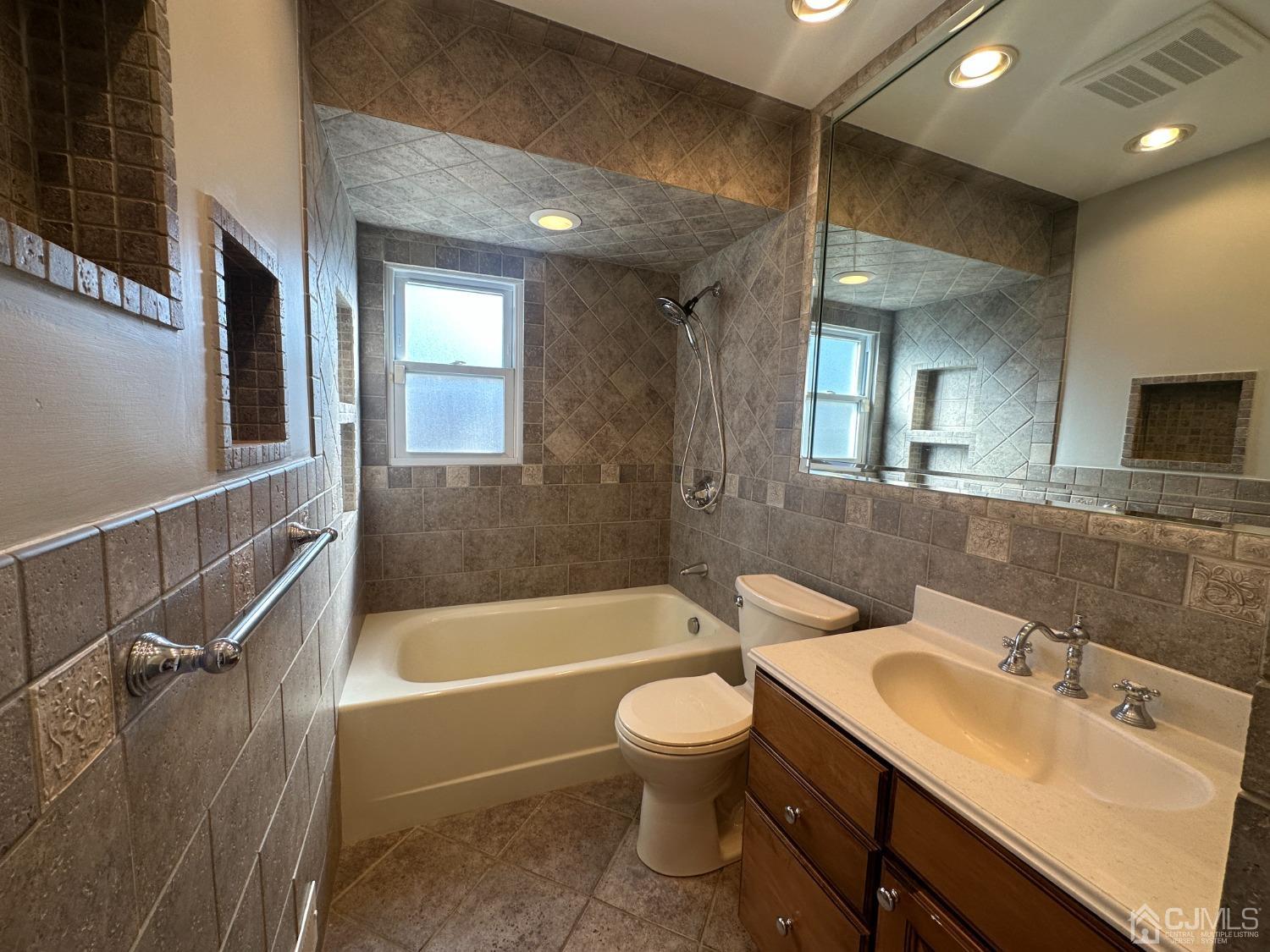 3 Hill Road Edison, NJ 08817 - Photo 12 of 27 a bathroom with a sink toilet tub and shower