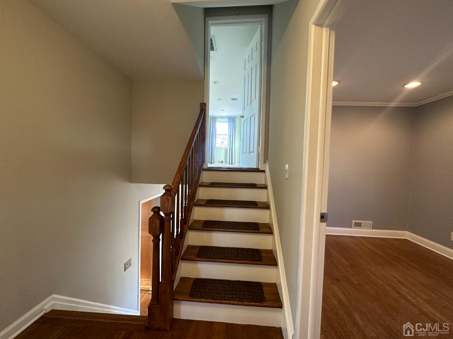 3 Hill Road Edison, NJ 08817 - Photo 16 of 27 a view of entryway with wooden floor and stairs