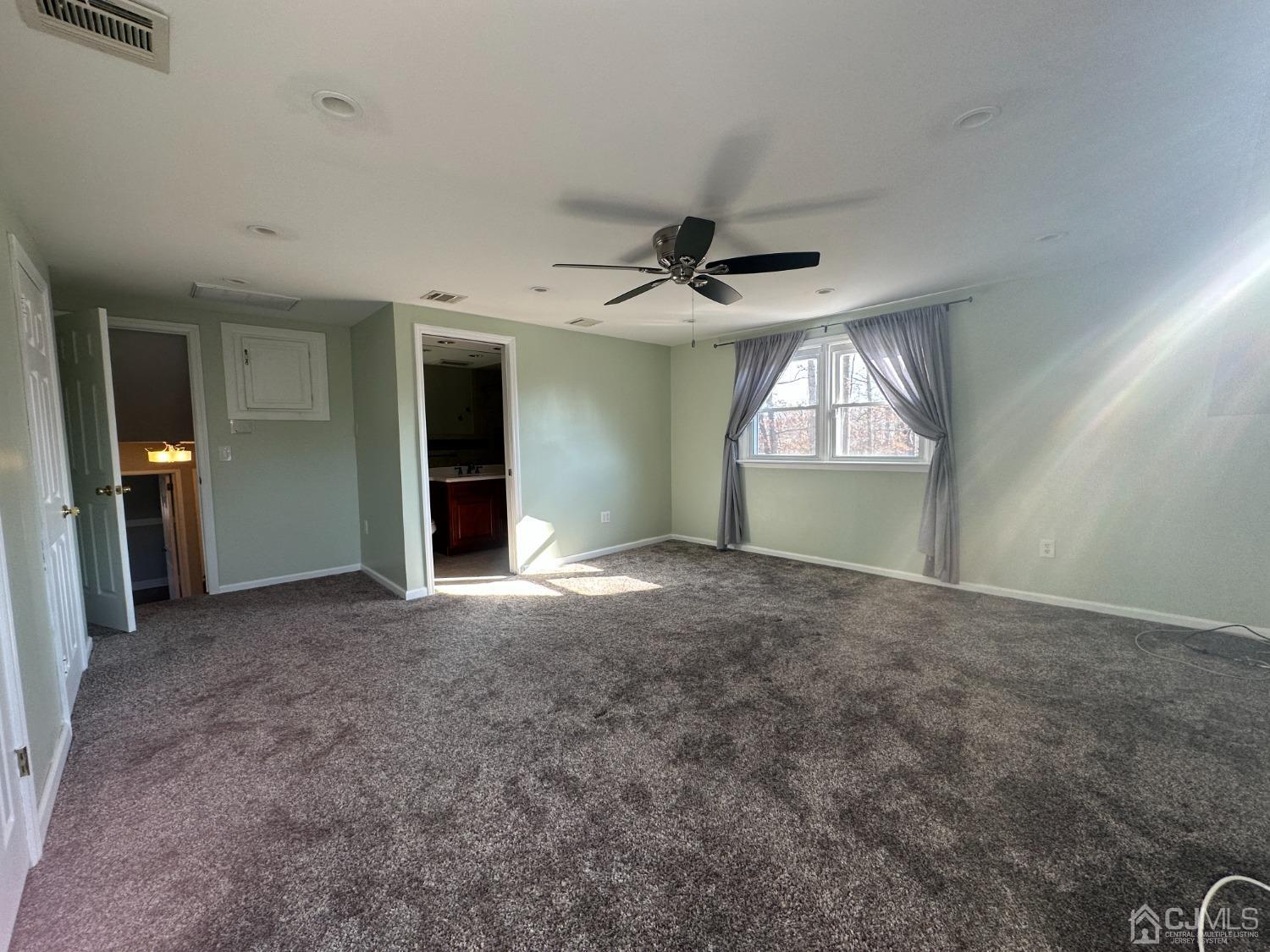 3 Hill Road Edison, NJ 08817 - Photo 18 of 27 an empty room with an empty space and windows