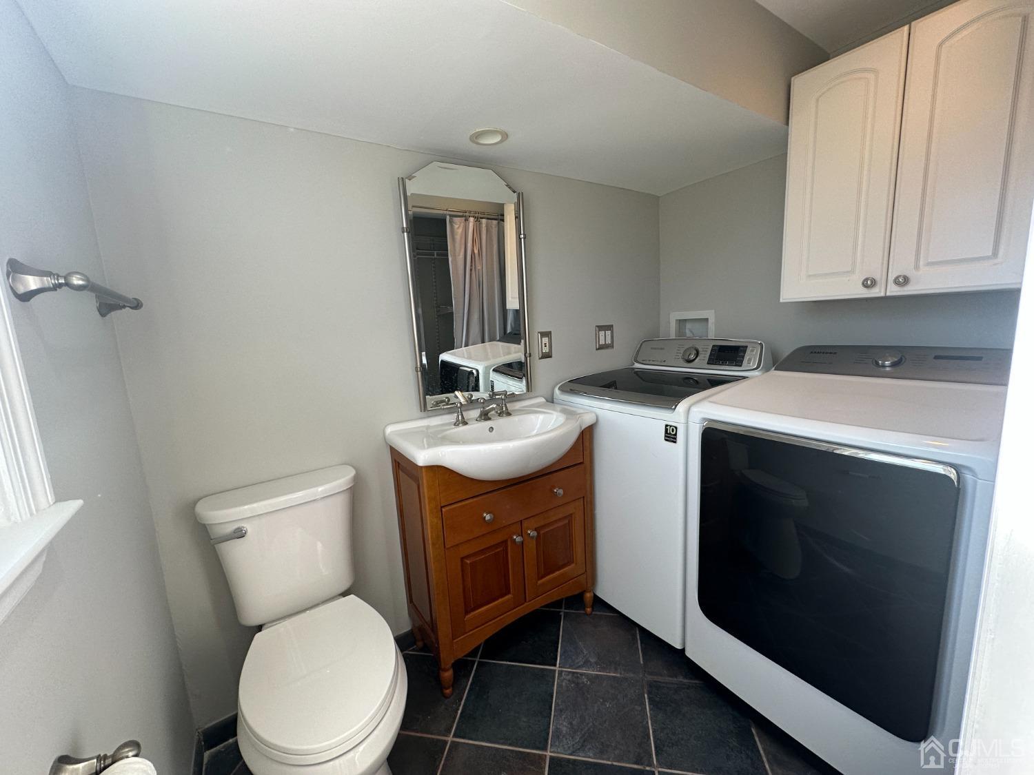 3 Hill Road Edison, NJ 08817 - Photo 24 of 27 a bathroom with a toilet sink and mirror