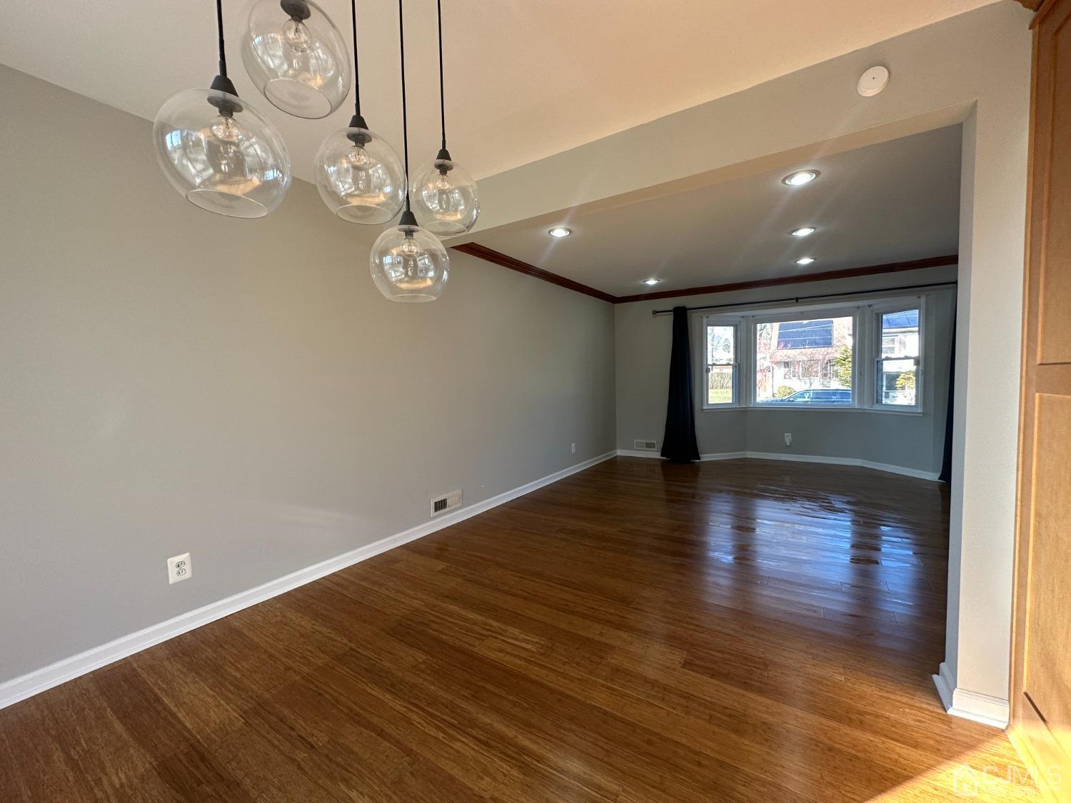 3 Hill Road Edison, NJ 08817 - Photo 5 of 27 wooden floor in an empty room with a window