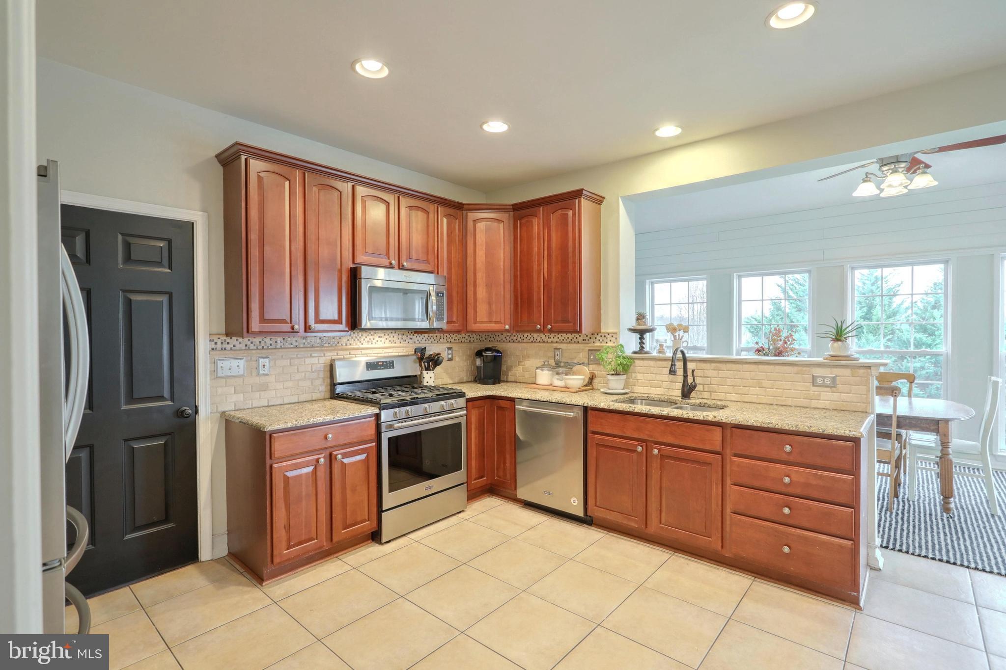 48 Smith Mill Road New Freedom, PA 17349 - Photo 16 of 40 Cherry cabinets, stainless appliances.