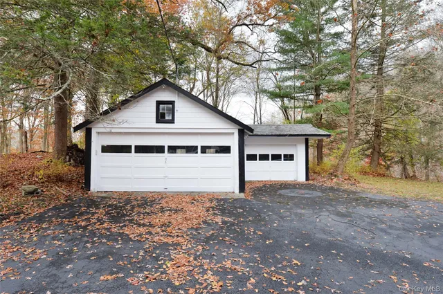 a house with trees in the background