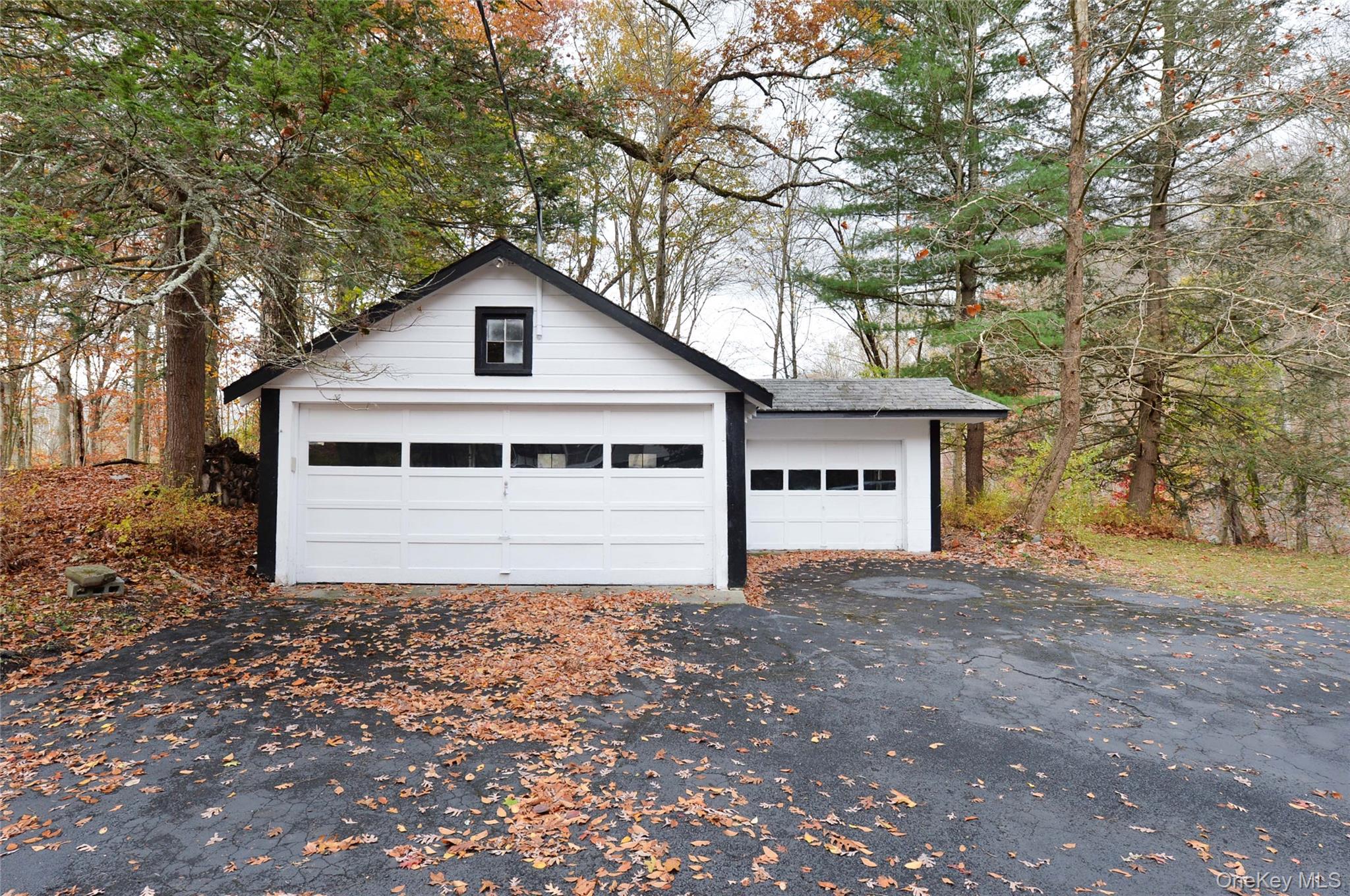 19 Johnsontown Road Sloatsburg, NY 10974 - Photo 4 of 41 a house with trees in the background