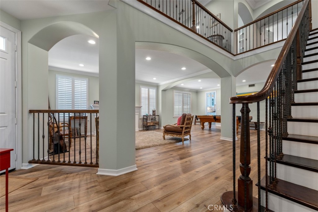124 Nighthawk Irvine, CA 92604 - Photo 23 of 61 a view of entryway livingroom and hall with wooden floor