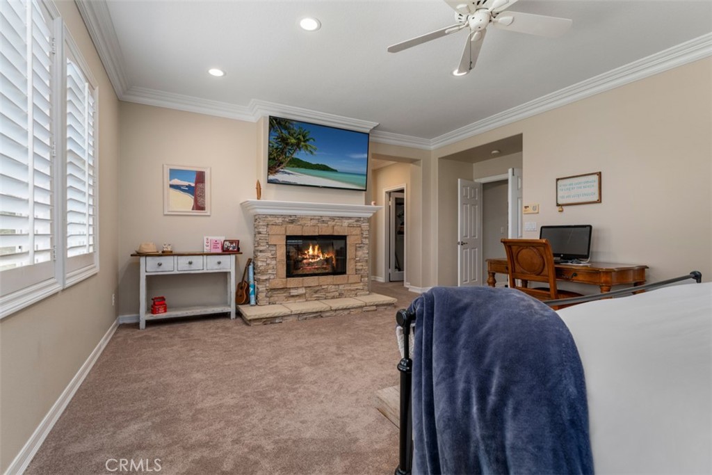 124 Nighthawk Irvine, CA 92604 - Photo 41 of 61 a living room with furniture and a fireplace