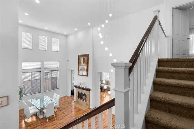 a bedroom with a bed and a fireplace