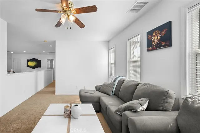 an aerial view of a house with swimming pool and outdoor space