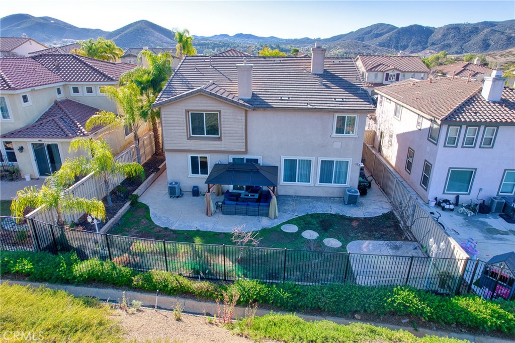 35424 Saddle Hill Road Lake Elsinore, CA 92532 - Photo 43 of 63 a aerial view of a house with a garden and plants