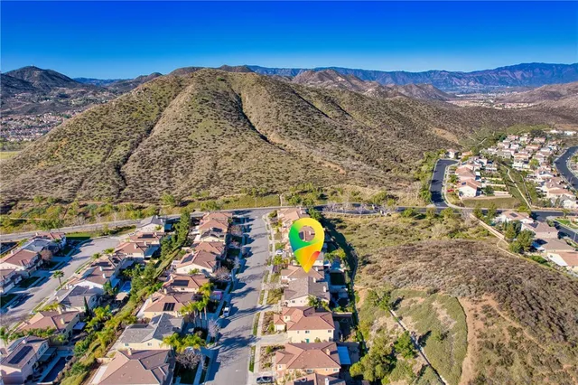 a view of a swimming pool with a yard