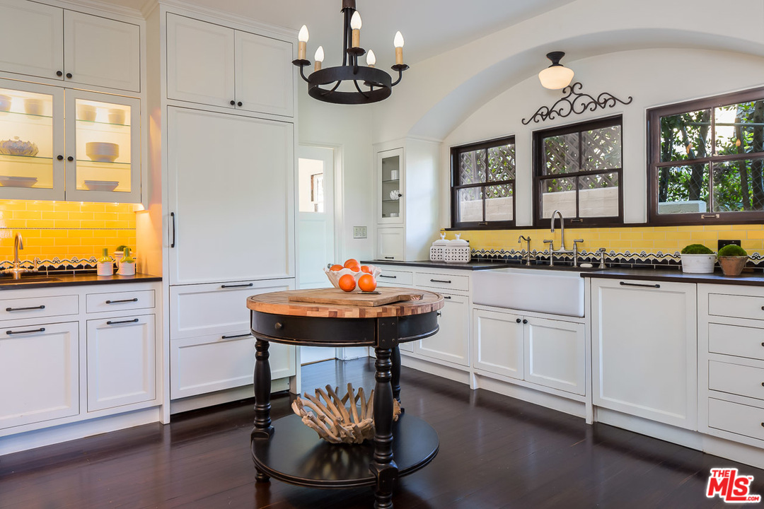 4342 Cedarhurst Circle Los Angeles, CA 90027 - Photo 12 of 44 a room with kitchen island granite countertop furniture and a sink
