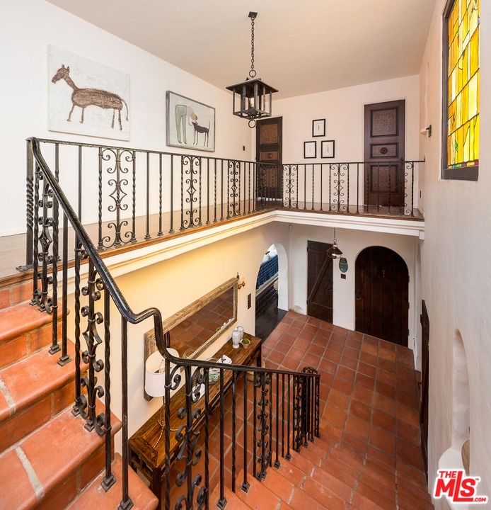 4342 Cedarhurst Circle Los Angeles, CA 90027 - Photo 16 of 44 a view of a balcony with furniture and a fireplace