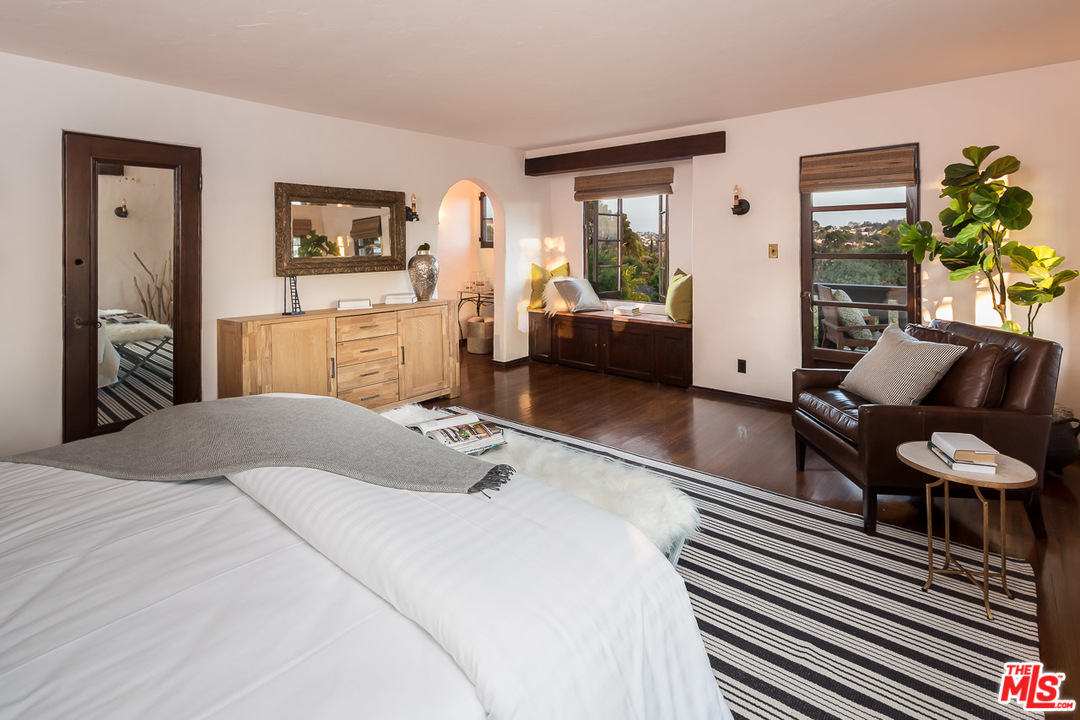 4342 Cedarhurst Circle Los Angeles, CA 90027 - Photo 19 of 44 a bedroom with a bed a couch and dresser