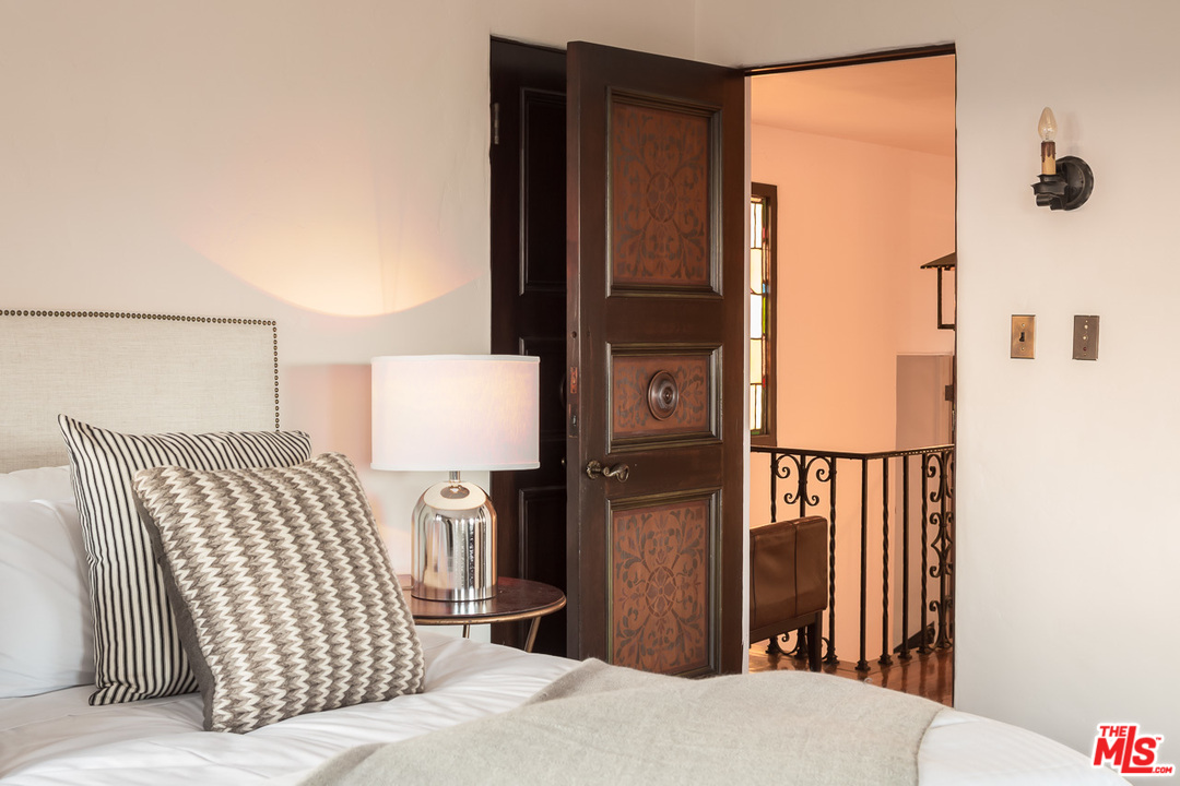 4342 Cedarhurst Circle Los Angeles, CA 90027 - Photo 20 of 44 a bedroom with a bed and a window