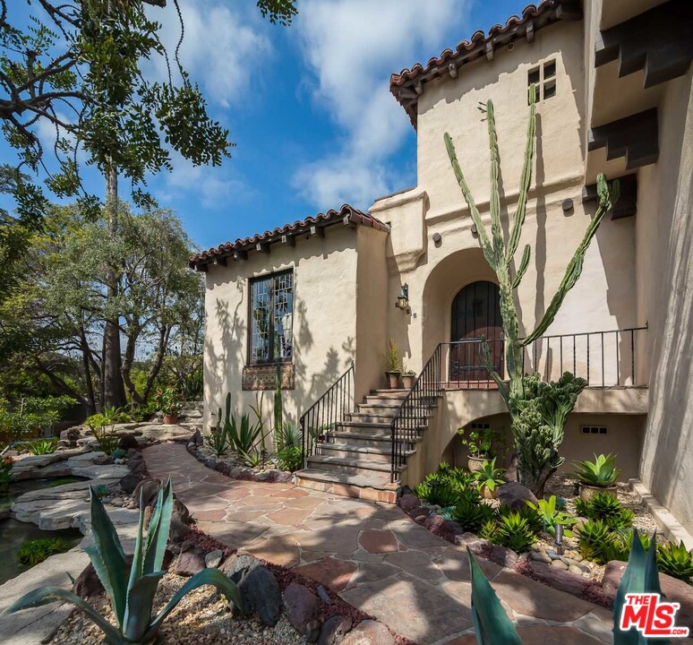 4342 Cedarhurst Circle Los Angeles, CA 90027 - Photo 4 of 44 front view of house with potted plants