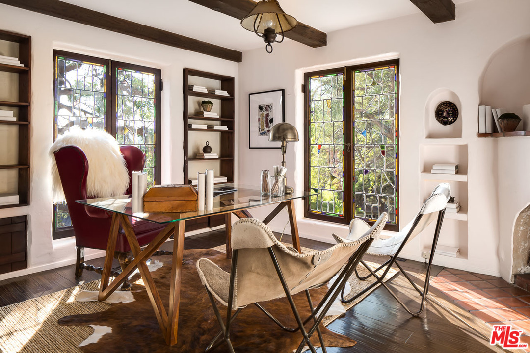 4342 Cedarhurst Circle Los Angeles, CA 90027 - Photo 31 of 44 a view of a dining room with furniture window and wooden floor