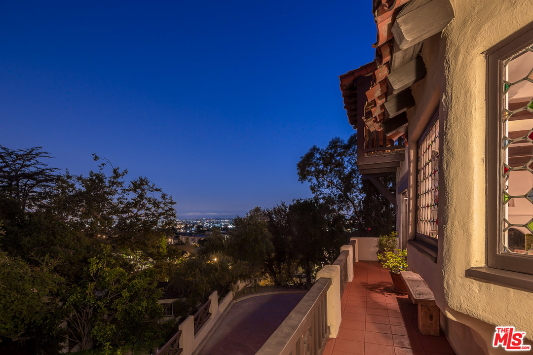 4342 Cedarhurst Circle Los Angeles, CA 90027 - Photo 38 of 44 a view of balcony with wooden floor and city view