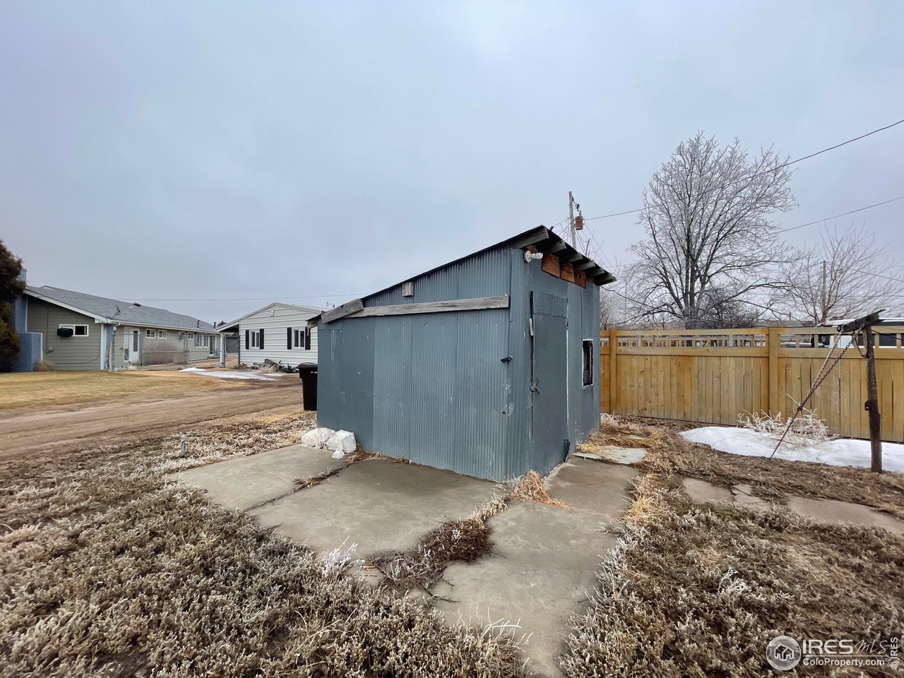 540 5th Street Stratton, CO 80836 - Photo 10 of 11 storage shed on cement slab at alley