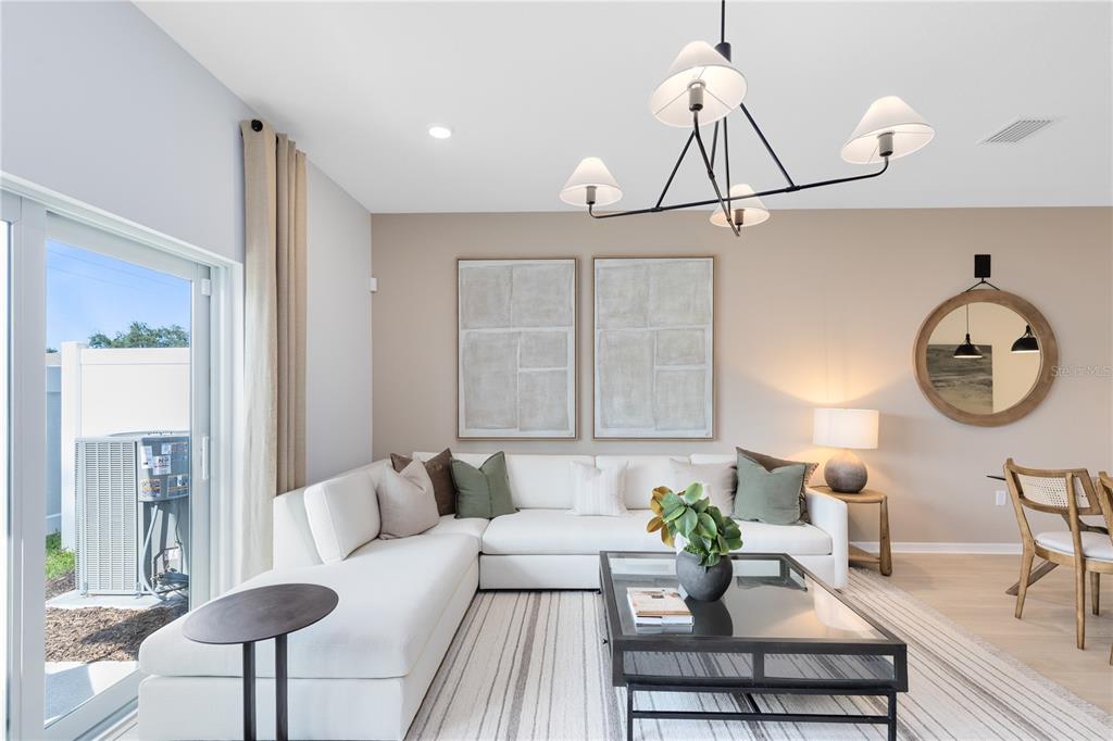4315 Jetty Lane Palm Bay, FL 32905 - Photo 13 of 32 a living room with furniture and wooden floor