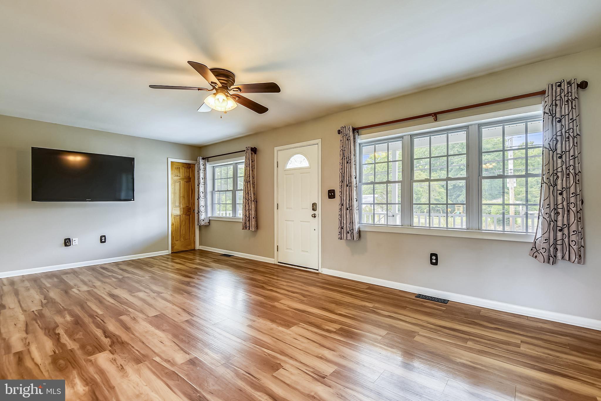 1503 Old Philadelphia Road Aberdeen, MD 21001 - Photo 11 of 40 Living Room with Pocket door Closet