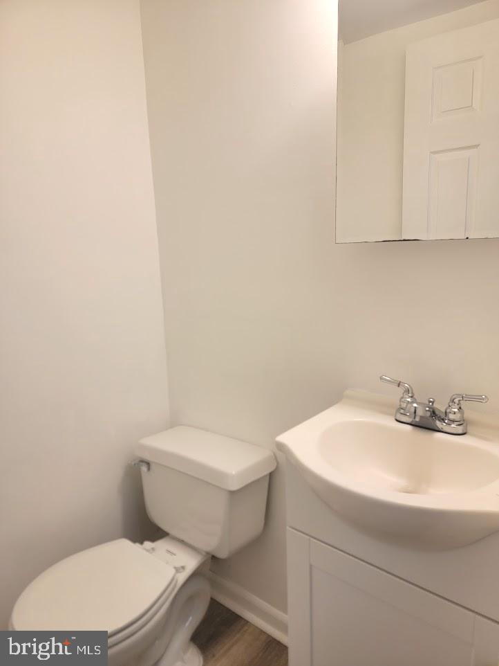 59 Noble Road Sicklerville, NJ 08081 - Photo 12 of 12 a white toilet sitting next to a white sink