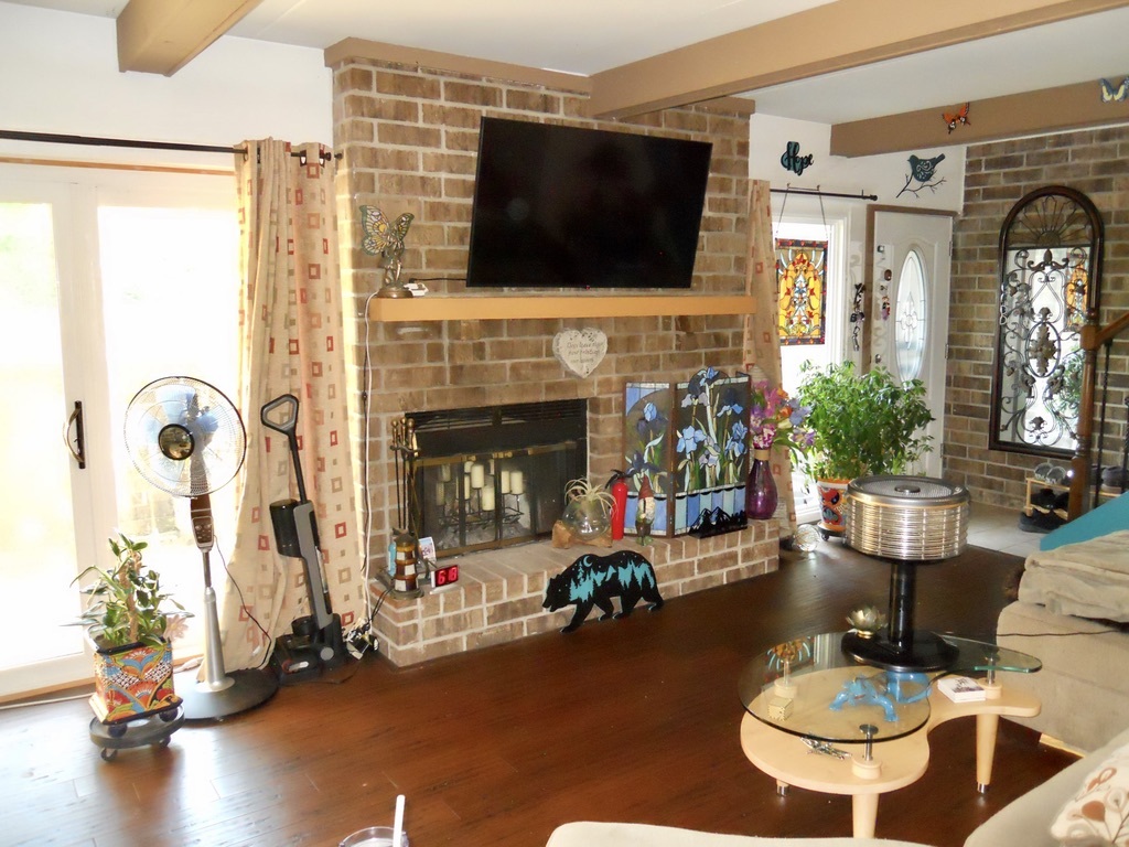 108 Kenneth Circle Elgin, IL 60120 - Photo 6 of 28 a living room with furniture fireplace and flat screen tv