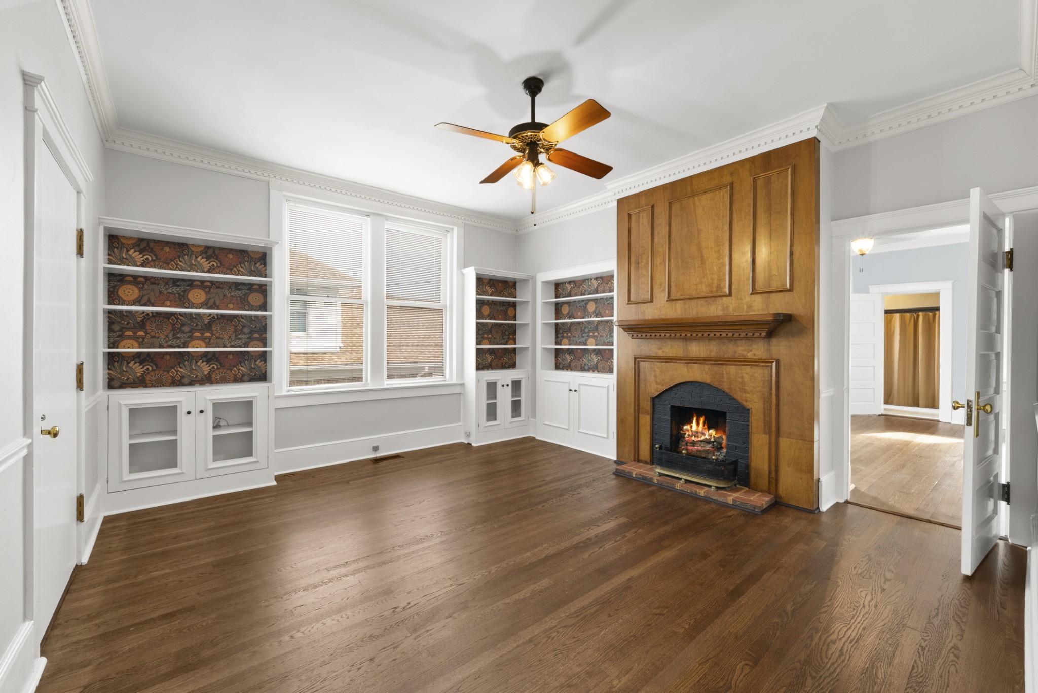 343 Forrest Street Lewisburg, TN 37091 - Photo 14 of 84 a view of empty room with wooden floor and fireplace