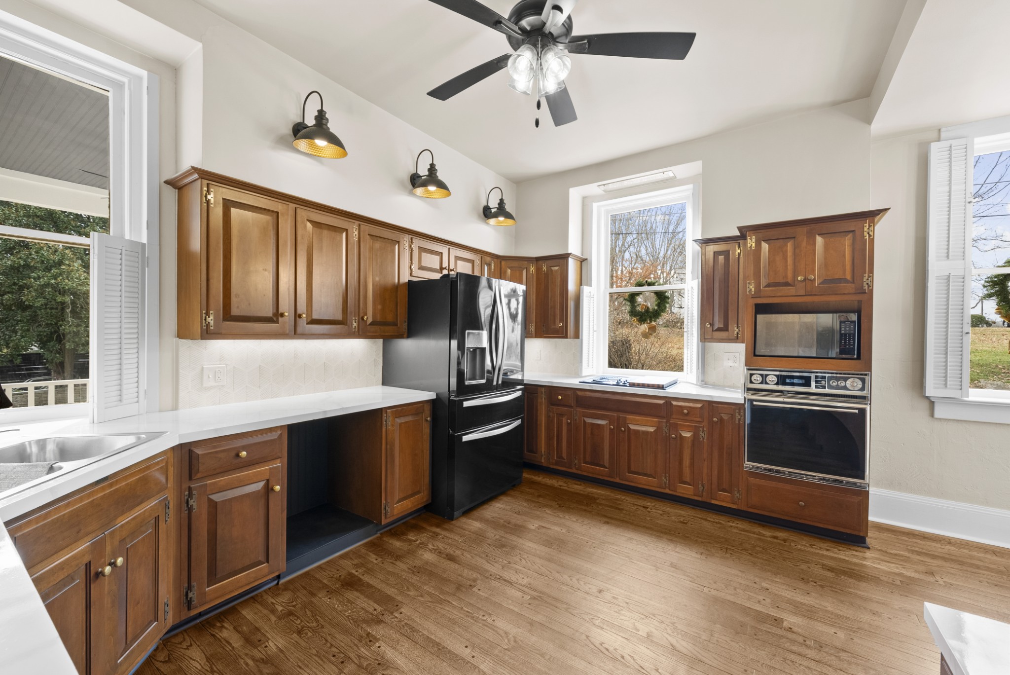 343 Forrest Street Lewisburg, TN 37091 - Photo 18 of 84 a kitchen with stainless steel appliances granite countertop a stove and a sink