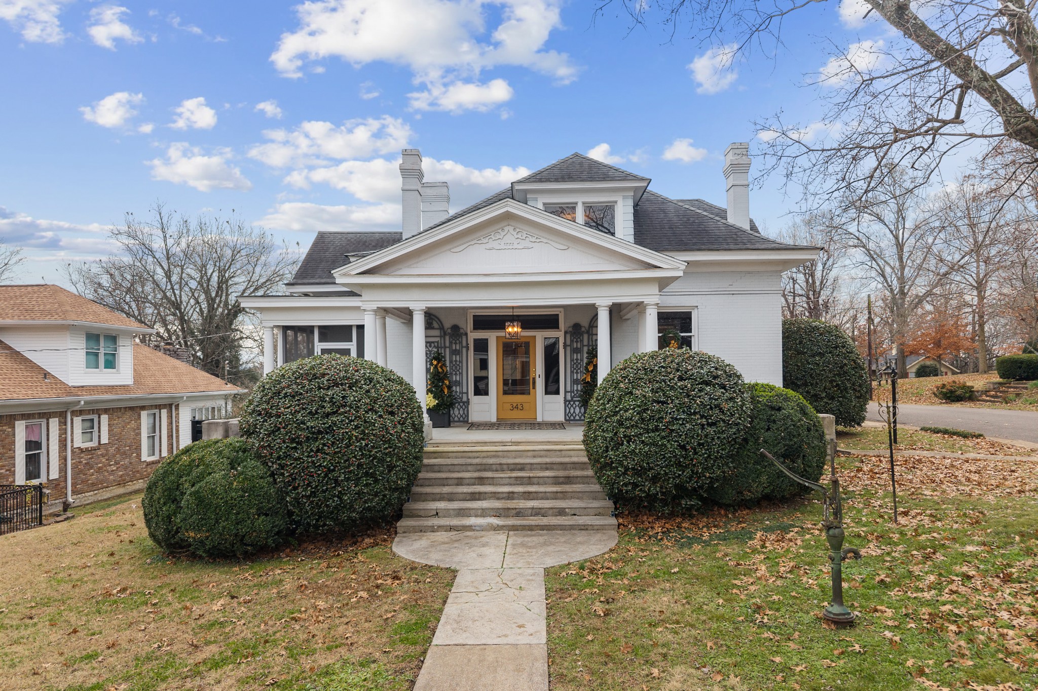 343 Forrest Street Lewisburg, TN 37091 - Photo 2 of 84 a front view of a house with a garden
