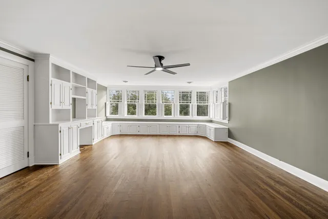 an empty room with windows