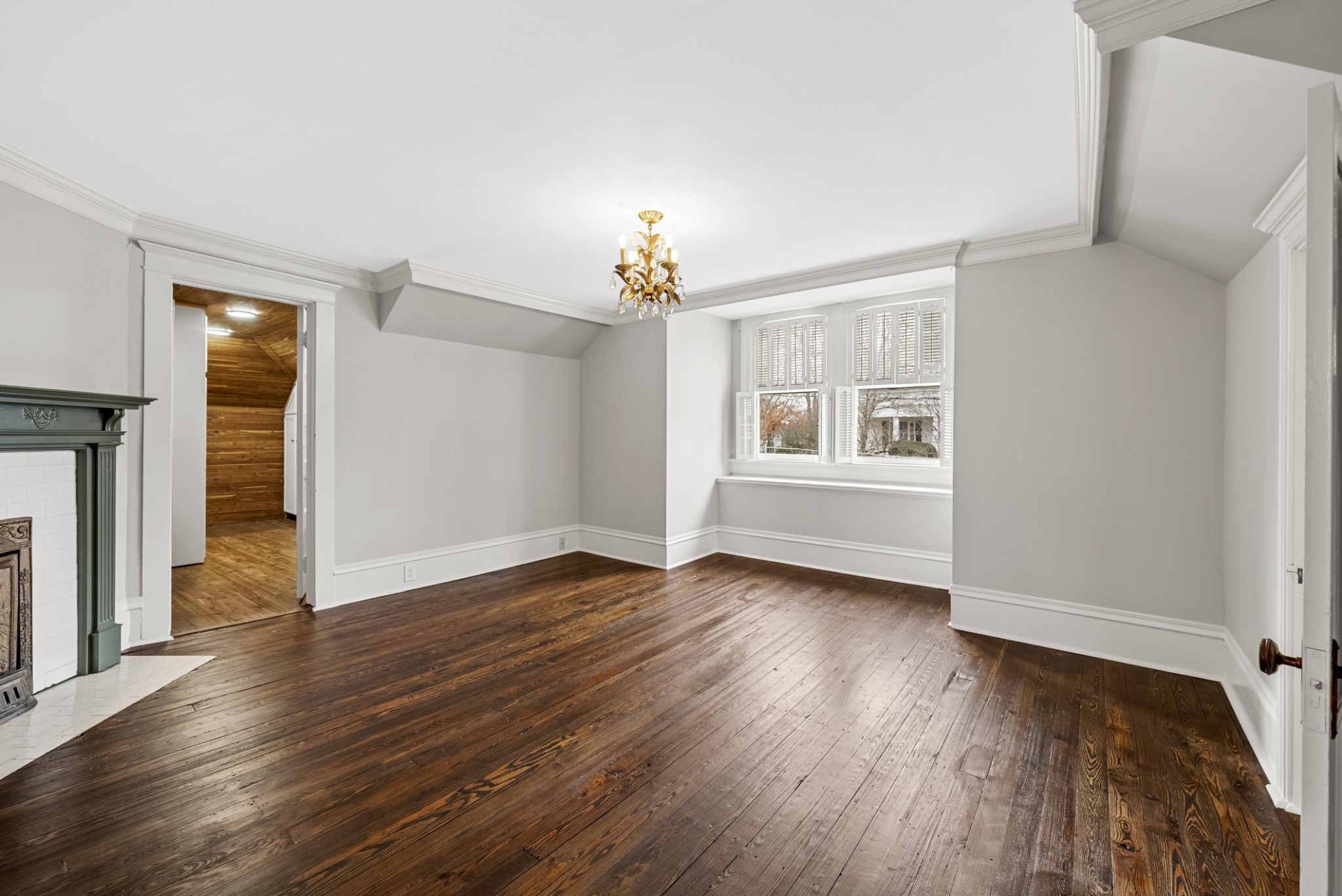 343 Forrest Street Lewisburg, TN 37091 - Photo 49 of 84 an empty room with wooden floor fireplace and windows