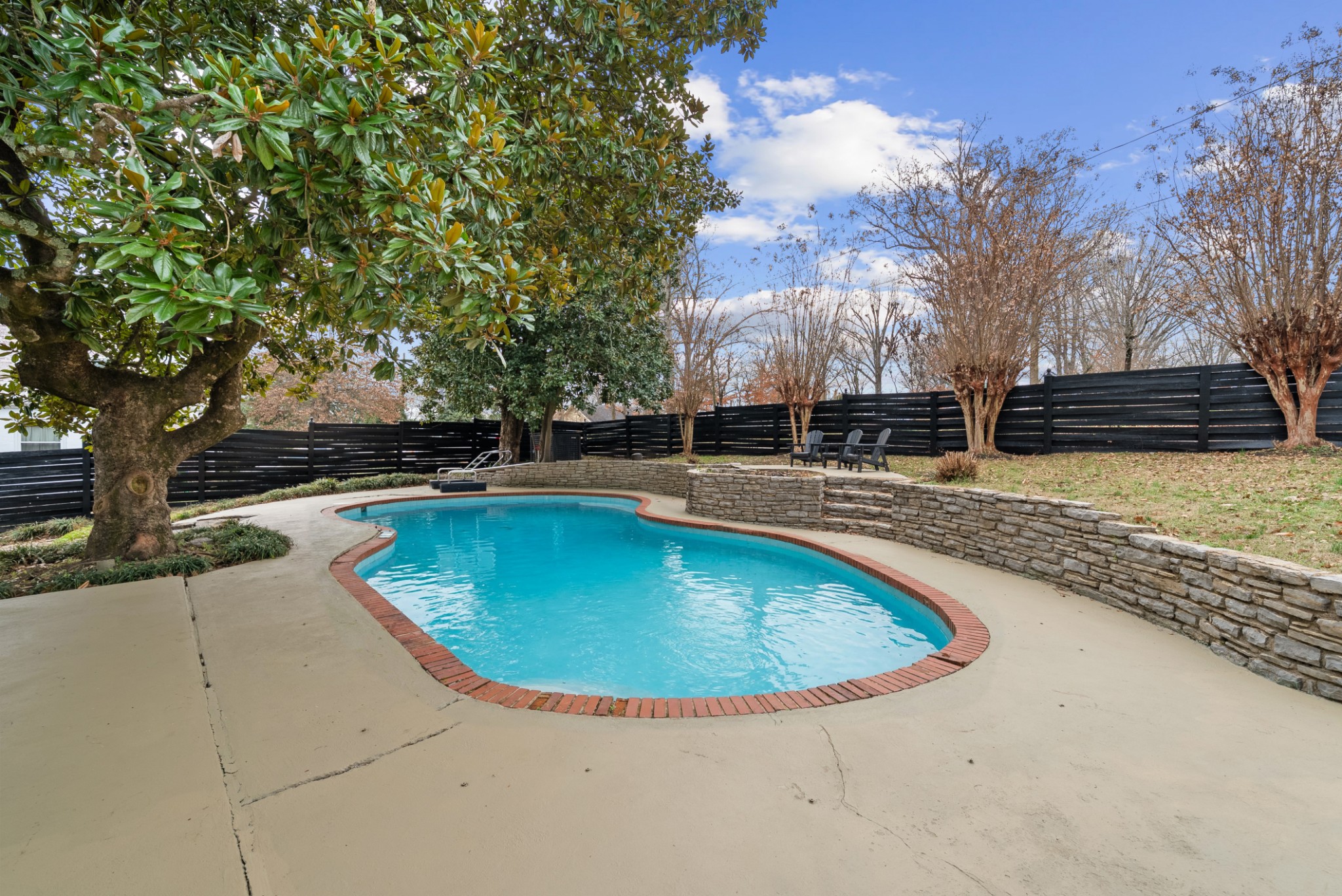 343 Forrest Street Lewisburg, TN 37091 - Photo 58 of 84 a view of a swimming pool with an outdoor space