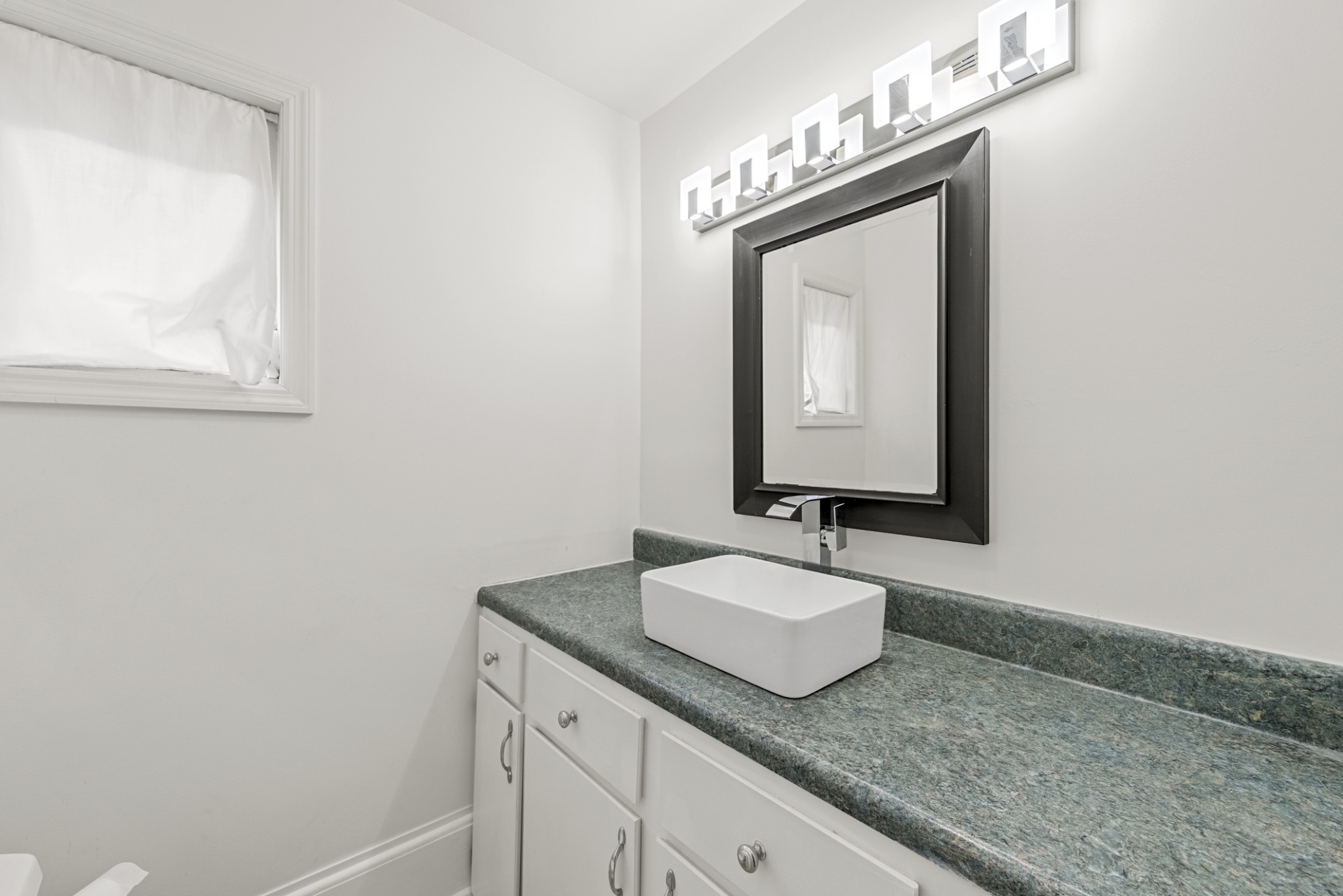 343 Forrest Street Lewisburg, TN 37091 - Photo 67 of 84 a bathroom with a granite countertop sink and a mirror