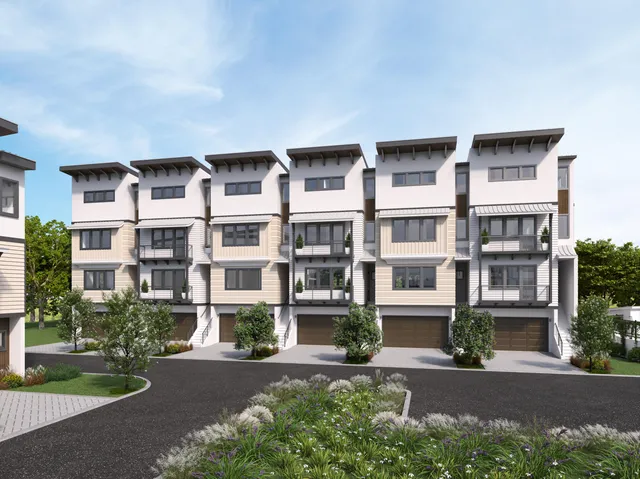 a front view of a building with garden