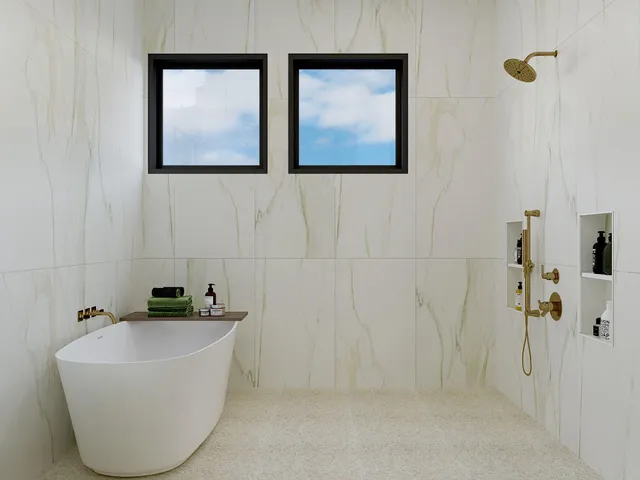 a bathroom with a bathtub and shower