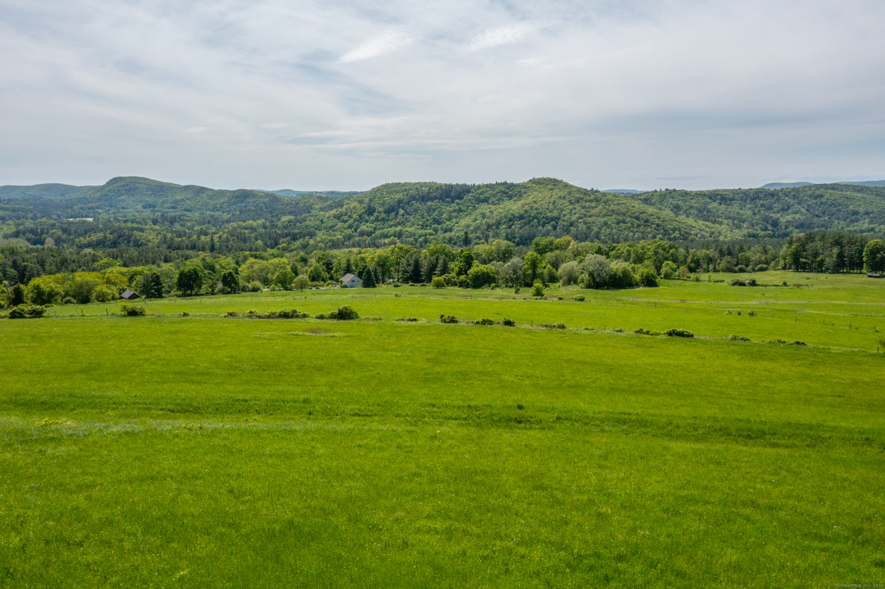 198-1 Beebe Hill Road Falls Village, CT 06031 - Photo 8 of 10 a view of grassy field with mountain