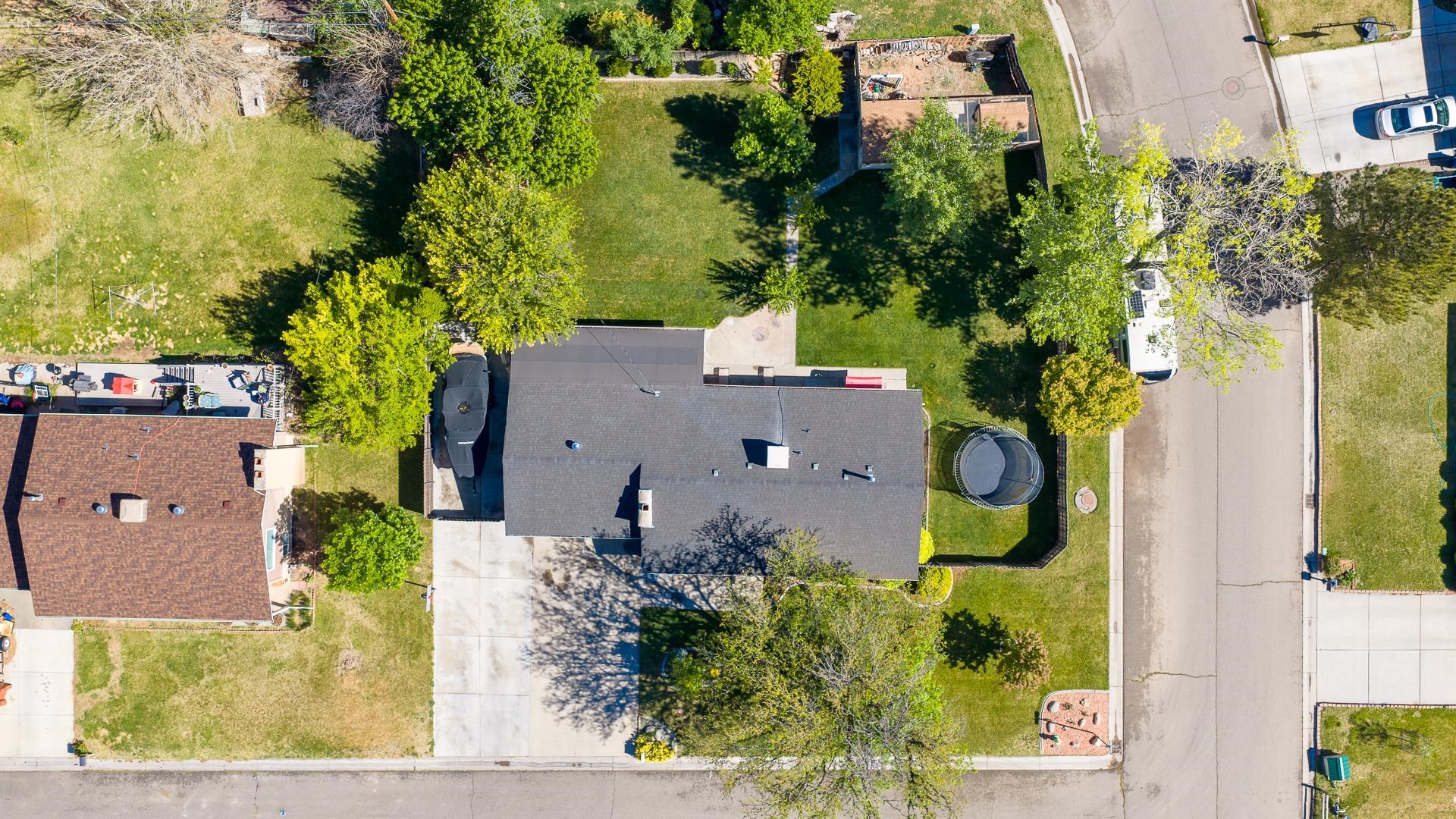 2118 Saguaro Road Grand Junction, CO 81507 - Photo 41 of 42 an aerial view of a house with a yard and garden