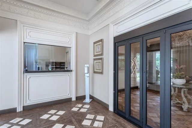 a view of a livingroom with furniture window and wooden floor