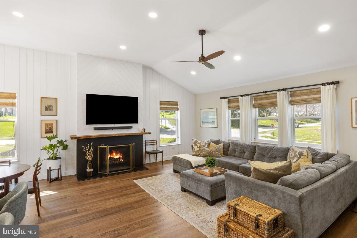 1401 Carol Road Jenkintown, PA 19046 - Photo 11 of 30 a living room with fireplace furniture and a flat screen tv