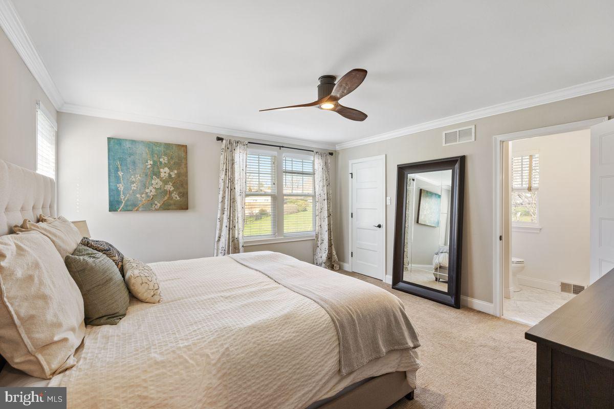 1401 Carol Road Jenkintown, PA 19046 - Photo 14 of 30 a bedroom with a large bed and a painting