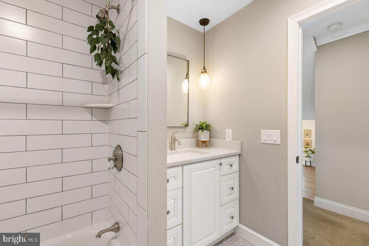 1401 Carol Road Jenkintown, PA 19046 - Photo 21 of 30 a bathroom with a shower and a sink