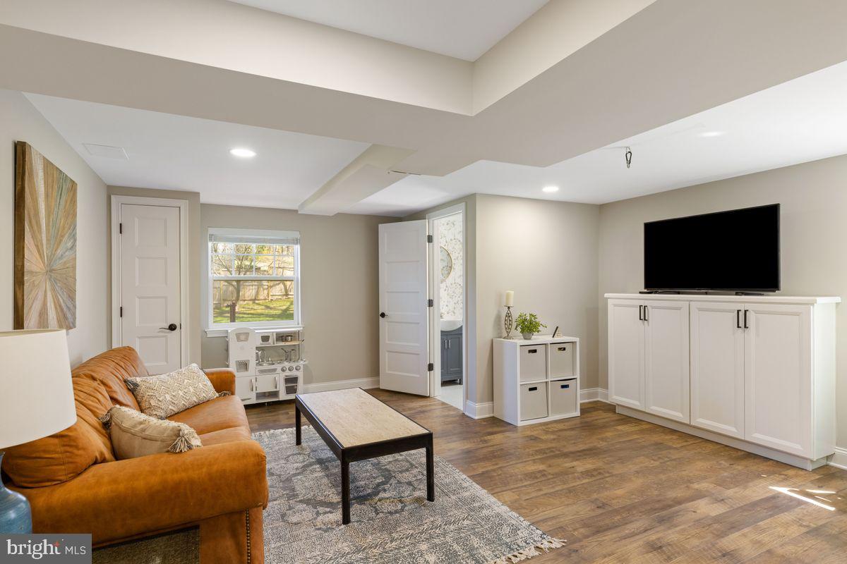 1401 Carol Road Jenkintown, PA 19046 - Photo 23 of 30 a living room with furniture and a flat screen tv