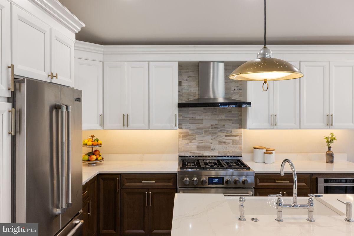 1401 Carol Road Jenkintown, PA 19046 - Photo 6 of 30 a kitchen with a refrigerator and a stove