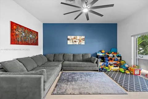 a living room with furniture and a couch